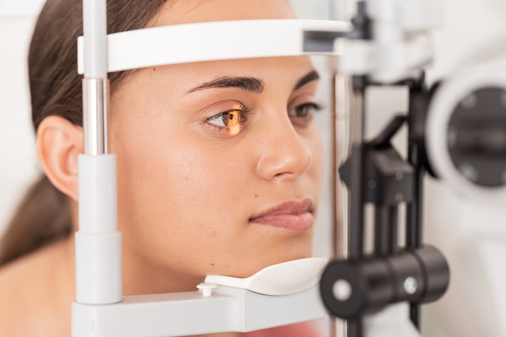 Girl having eye examination